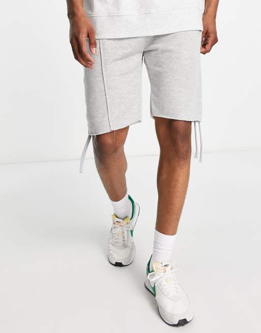 PUMA x MARKET Regular 8 inch shorts in off-white