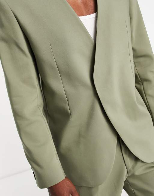 Americana de traje caquis técnica Viera de Viggo, 4 de 4