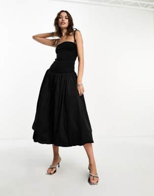 AMY LYNN ALEXA SHOULDER TIE PUFFBALL MIDI DRESS IN BLACK