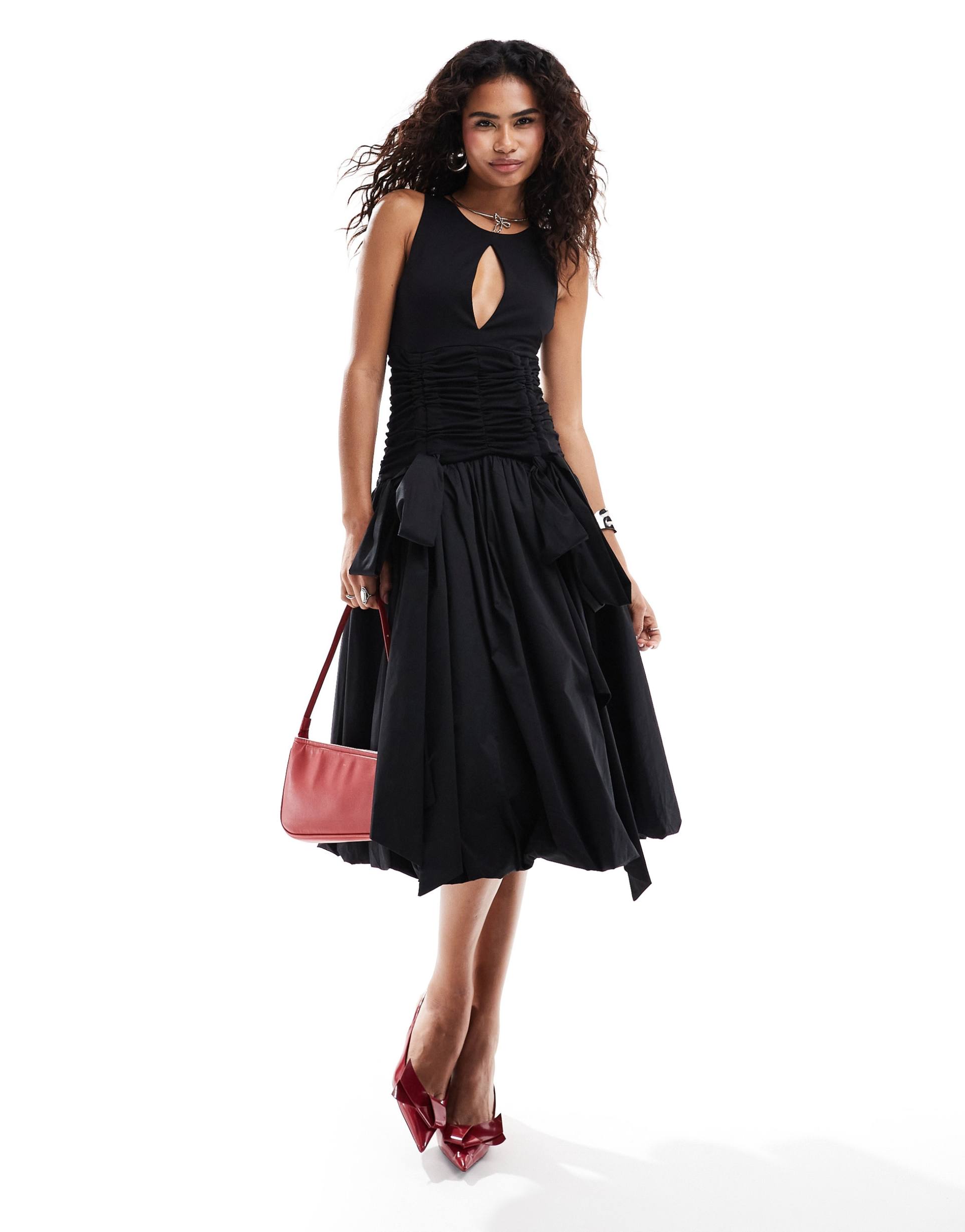 amy lynn bodhi slash cut out bubble midi dress in black