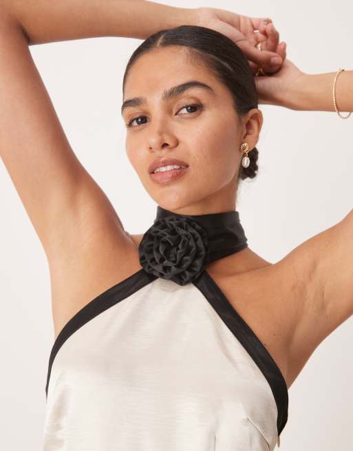 Amy Lynn contrast halter neck satin mini dress in soft gold and black