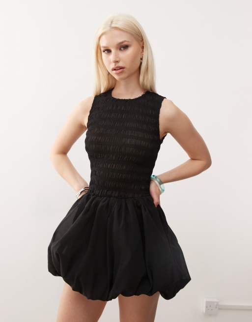 Amy Lynn Eleanor sleeveless puffball mini dress in black | ASOS