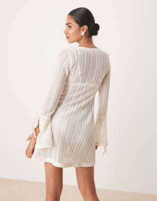 Amy Lynn Embellished Knit Button Through Mini Dress In White