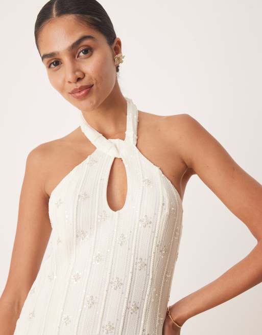 Amy Lynn embellished knit halter maxi dress with drop hem in cream | ASOS