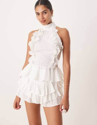 high neck ruffle peplum top in white eyelet