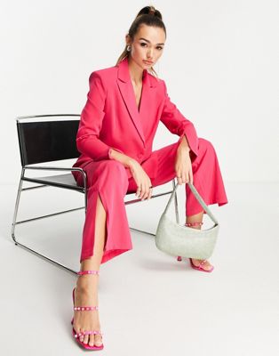 Amy Lynn oversized fluid crepe blazer co-ord with dramatic shoulder pads in fuchsia pink