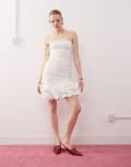 [Amy Lynn] Amy Lynn tie shoulder ruched mini dress with 3D hem in white 12 White