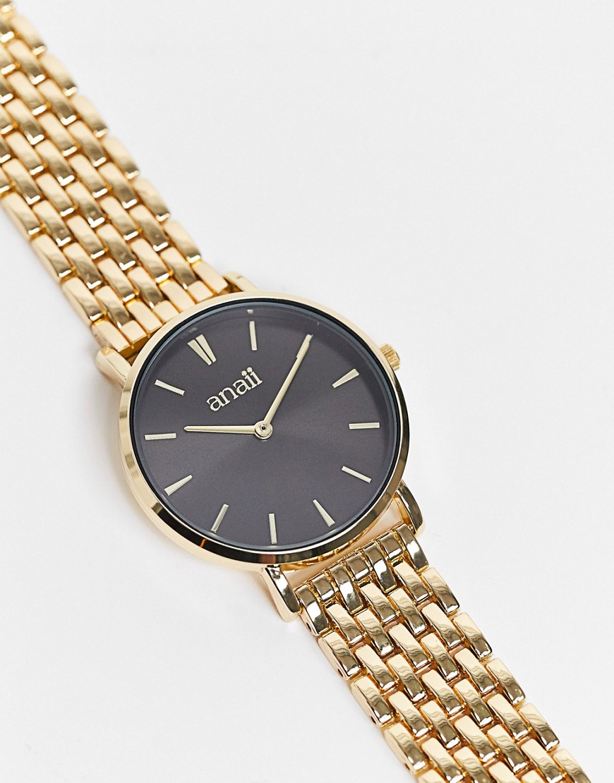 Anaii gold watch with black detail