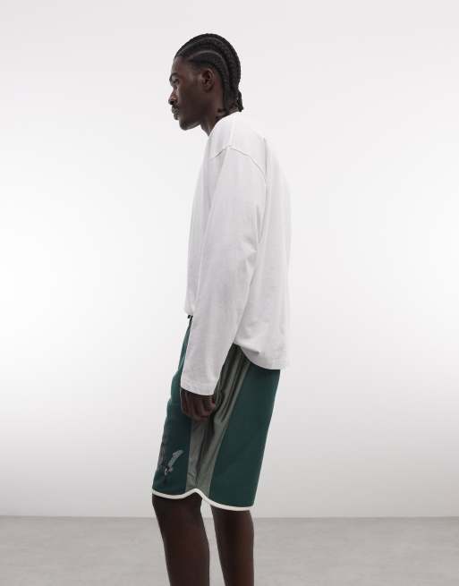 AND1 basketball shorts with contrast panels in dark green, 2 of 5