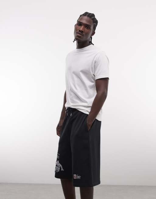 AND1 - On Court Basketball - Jorts neri in jersey con logo, 3 di 5