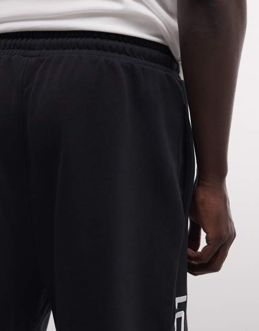 AND1 - On Court Basketball - Jorts neri in jersey con logo, 5 di 5