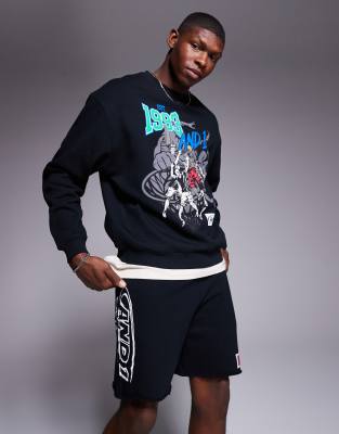 AND1 - Short oversize à bord brut et motif sport - Noir - view 1