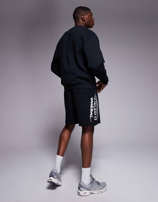 AND1 – Svarta shorts i oversize med sportigt tryck och råskuren fåll, 4 av 5