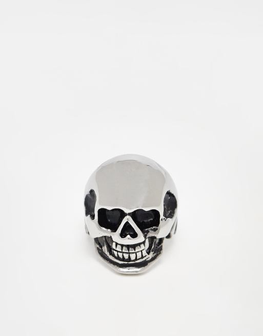 Anillo de tono plateado pulido tipo sello con diseño de calavera de acero inoxidable resistente al agua de ASOS DESIGN