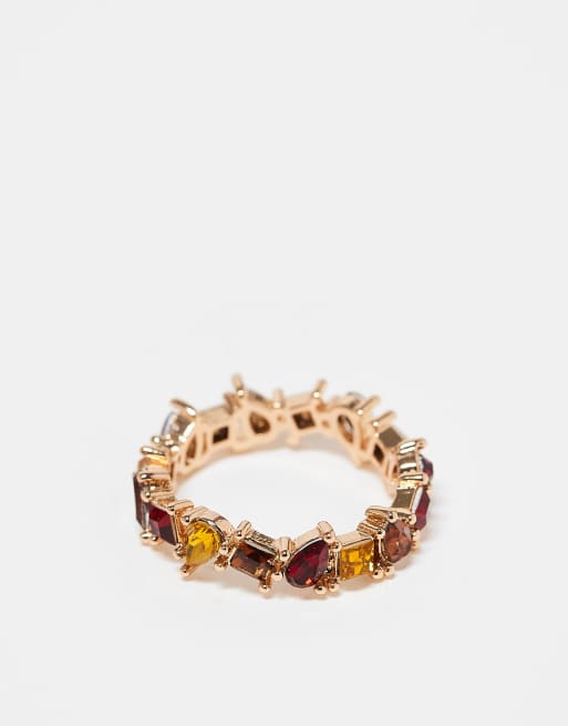 Anillo dorado con cristales de colores de ASOS DESIGN