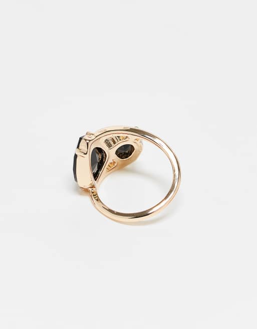 Anillo dorado con diseño envolvente y cristales negros de ASOS DESIGN, 3 de 3