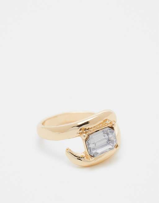 Anillo dorado con diseño envolvente y detalle de cristal de ASOS DESIGN