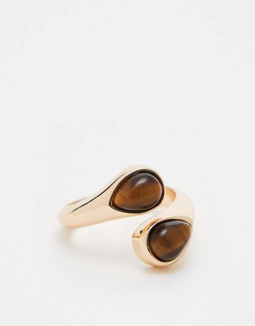 Anillo dorado con diseño envolvente y piedra semipreciosa de ojo de tigre de ASOS DESIGN