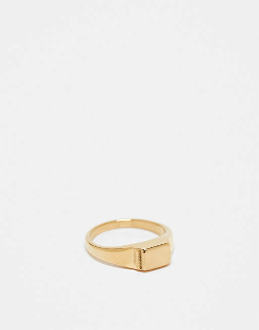 Anillo dorado tipo sello con parte superior cepillada de acero inoxidable resistente al agua de ASOS DESIGN