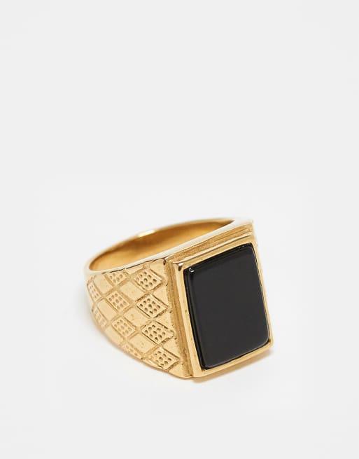 Anillo dorado tipo sello con piedra negra de ágata de acero inoxidable resistente al agua de ASOS DESIGN