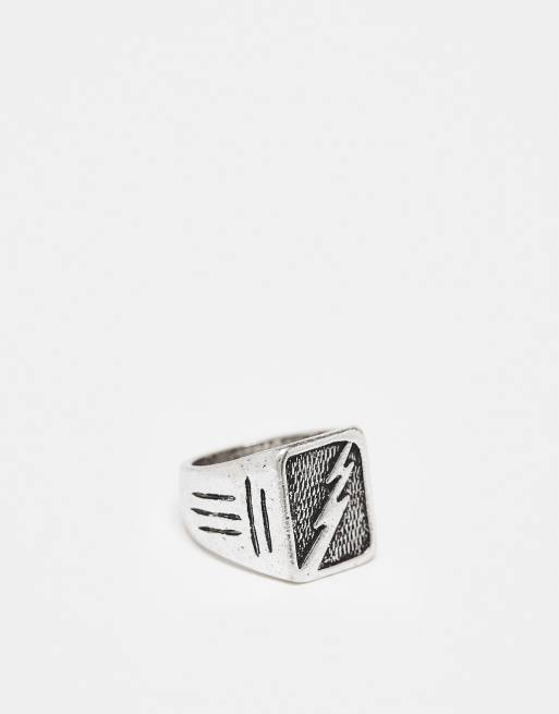 Anillo plateado tipo sello con detalle de rayo Elemental de Classics 77
