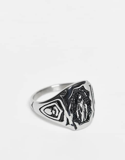 Anillo plateado tipo sello con diseño de la Virgen María de acero inoxidable resistente al agua de ASOS DESIGN