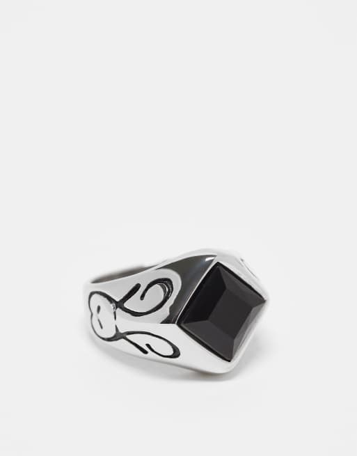 Anillo plateado tipo sello de acero inoxidable resistente al agua con detalle negro en forma de rombo de ASOS DESIGN 