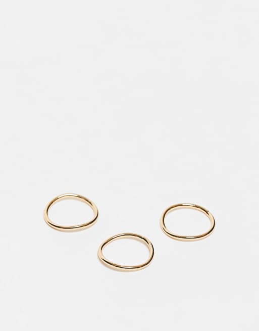 Anillos apilables plateados finos con diseño tubular chapados en oro de 14 quilates de ASOS DESIGN