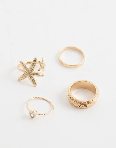 Anillos dorados apilables con diseño de estrellas de mar con adornos de ALDO - view 1