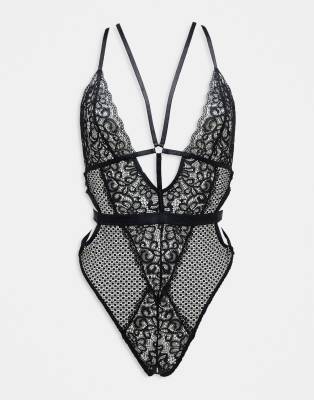 Ann Summers - Obsession - Body aus Spitze und Netzstoff in Schwarz mit tiefem Ausschnitt vorne, Trägern und offenem Schr...