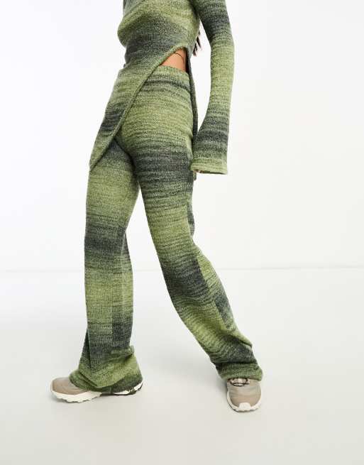 Annorlunda knitted flared trousers in olive stripe ombre co-ord