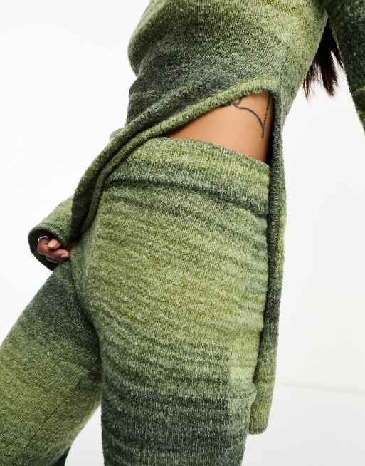 Annorlunda knitted flared trousers in olive stripe ombre co-ord