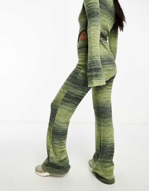 Annorlunda knitted flared trousers in olive stripe ombre co-ord