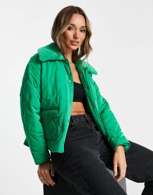 Annorlunda quilted jacket with faux fur collar in bright green