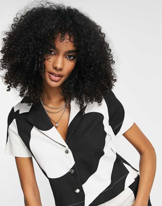 https://images.asos-media.com/products/annorlunda-retro-print-shirt-in-monochrome-part-of-a-set/202079706-4?$n_550w$&wid=550&fit=constrain