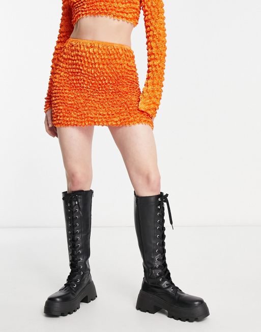 Annorlunda Super mini rok met popcorn textuur in fel oranje deel van co ord set