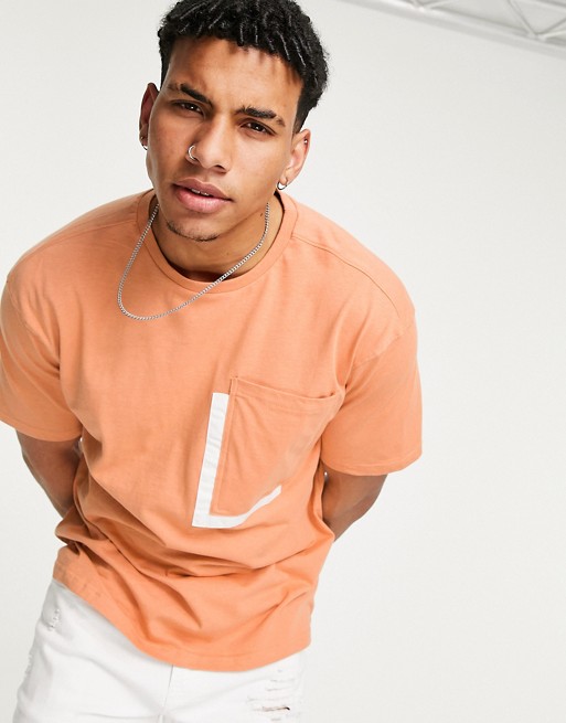 Another Influence boxy pocket t-shirt in orange