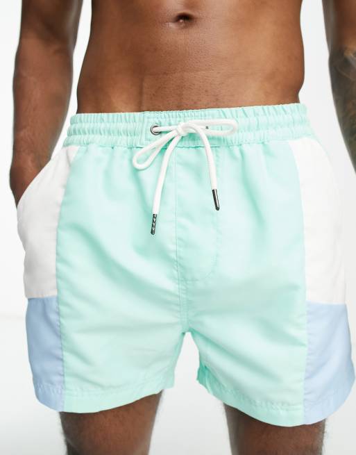 Another Influence colour block swim shorts in aqua blue and white