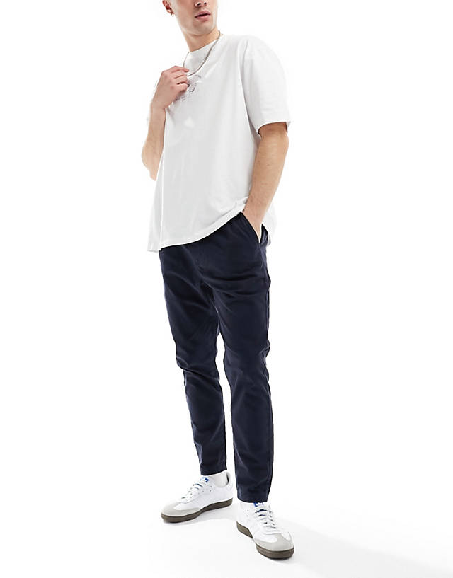 Another Influence - cotton twill tapered trousers in navy