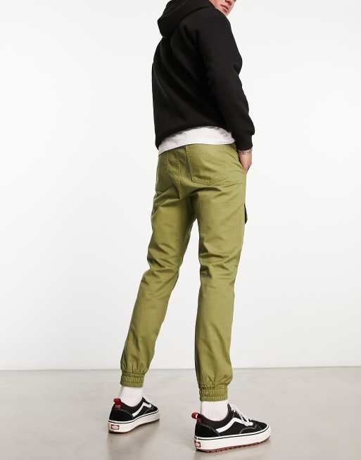 Green jogger clearance pants outfit mens