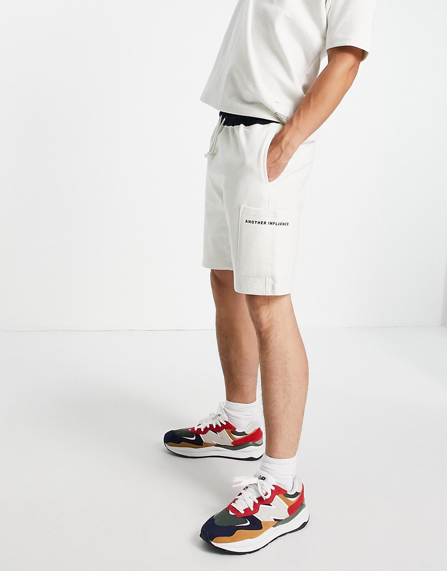 Another Influence jersey shorts with pocket in ecru-White