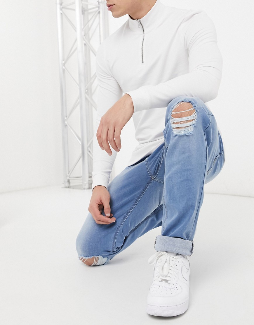 Another Influence – Ljusblå skinny jeans med knärevor