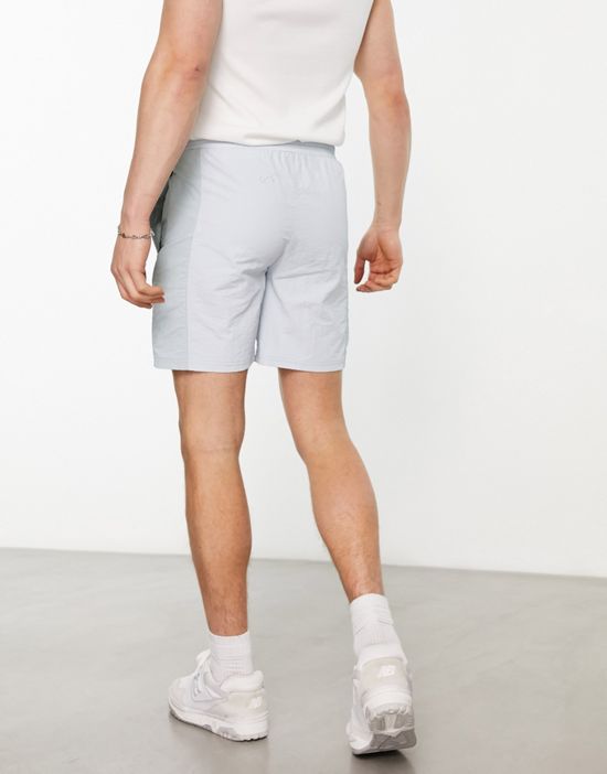 https://images.asos-media.com/products/another-influence-nylon-shorts-in-blue-part-of-a-set/204203617-2?$n_550w$&wid=550&fit=constrain