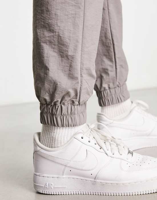 https://images.asos-media.com/products/another-influence-nylon-sweatpants-in-gray-part-of-a-set/204203447-2?$n_550w$&wid=550&fit=constrain