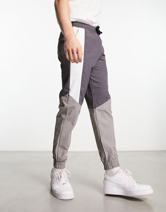 https://images.asos-media.com/products/another-influence-nylon-sweatpants-in-gray-part-of-a-set/204203447-4?$n_550w$&wid=550&fit=constrain