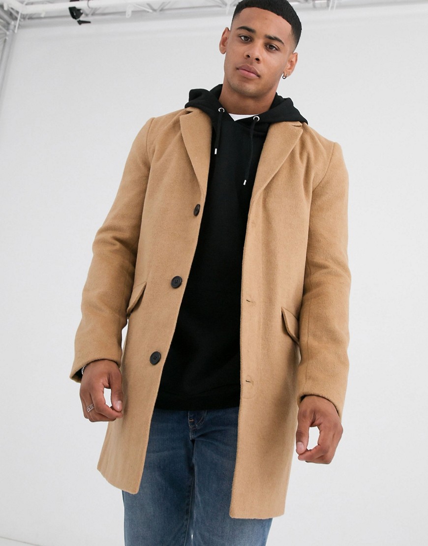 Another Influence over coat in tan