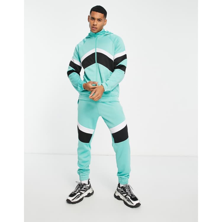 Another Influence retro matchday tracksuit set in turquoise ASOS