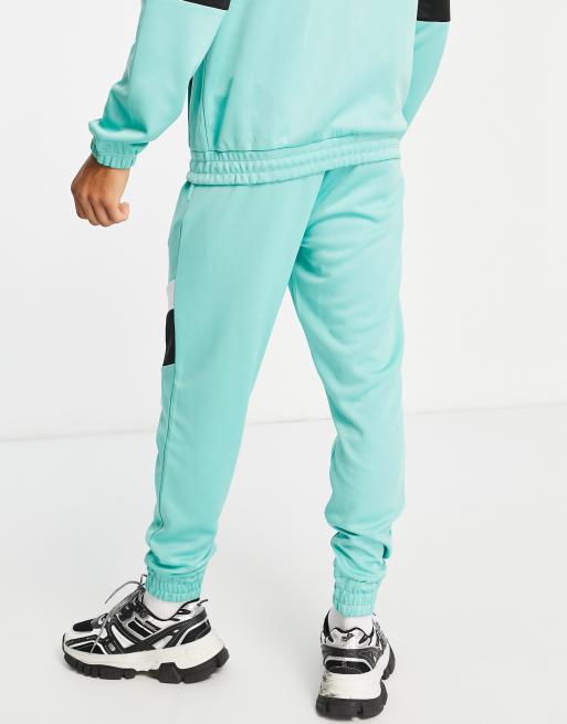 Another Influence retro matchday tracksuit set in turquoise