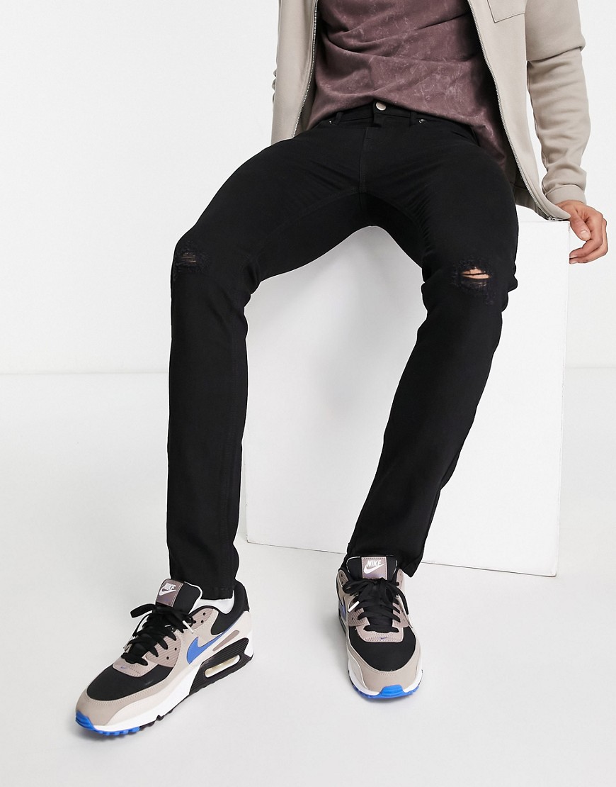 Another Influence skinny fit ripped jeans in black