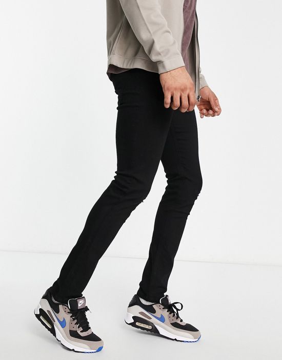 https://images.asos-media.com/products/another-influence-skinny-fit-ripped-jeans-in-black/202191535-4?$n_550w$&wid=550&fit=constrain